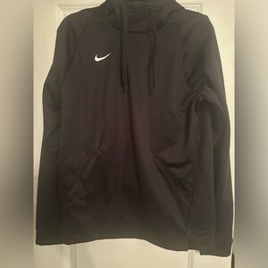 Woman’s black Nike funnel neck hoodie.
